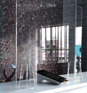 Clear protective screen, often used in public spaces for safety.